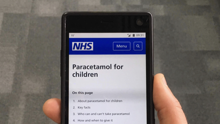 NHS website page on a phone: Paracetamol for children