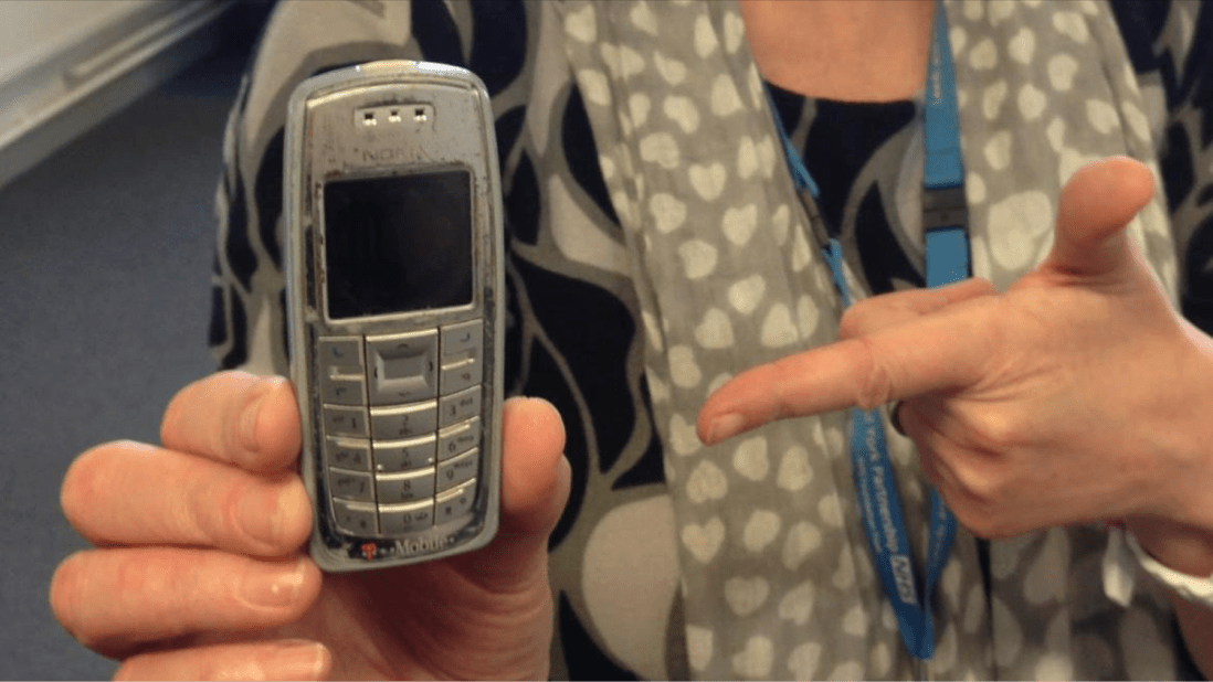 pointing at phone.png