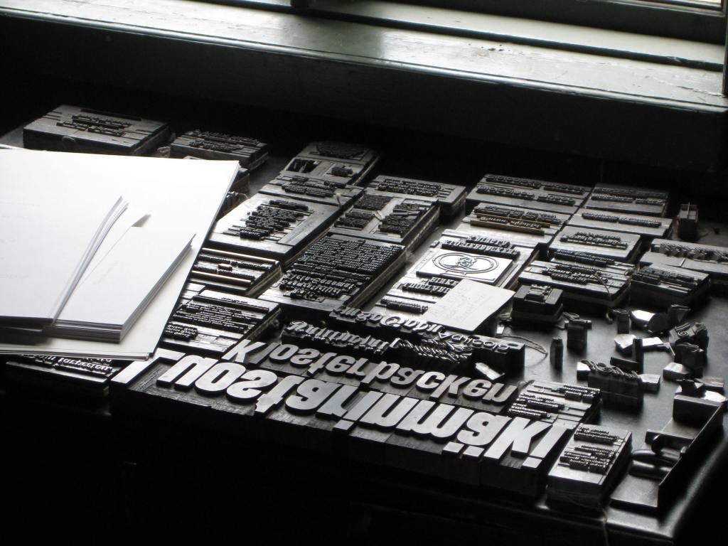 Metal type and paper