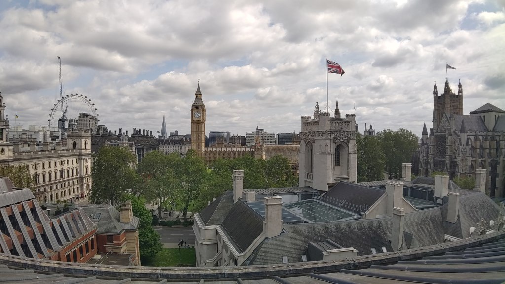 View across Westminster from the QE2 conference centre. In the distance left to right: the London Eye wheel, Big Ben and the houses of parliament, Westminster Abbey
